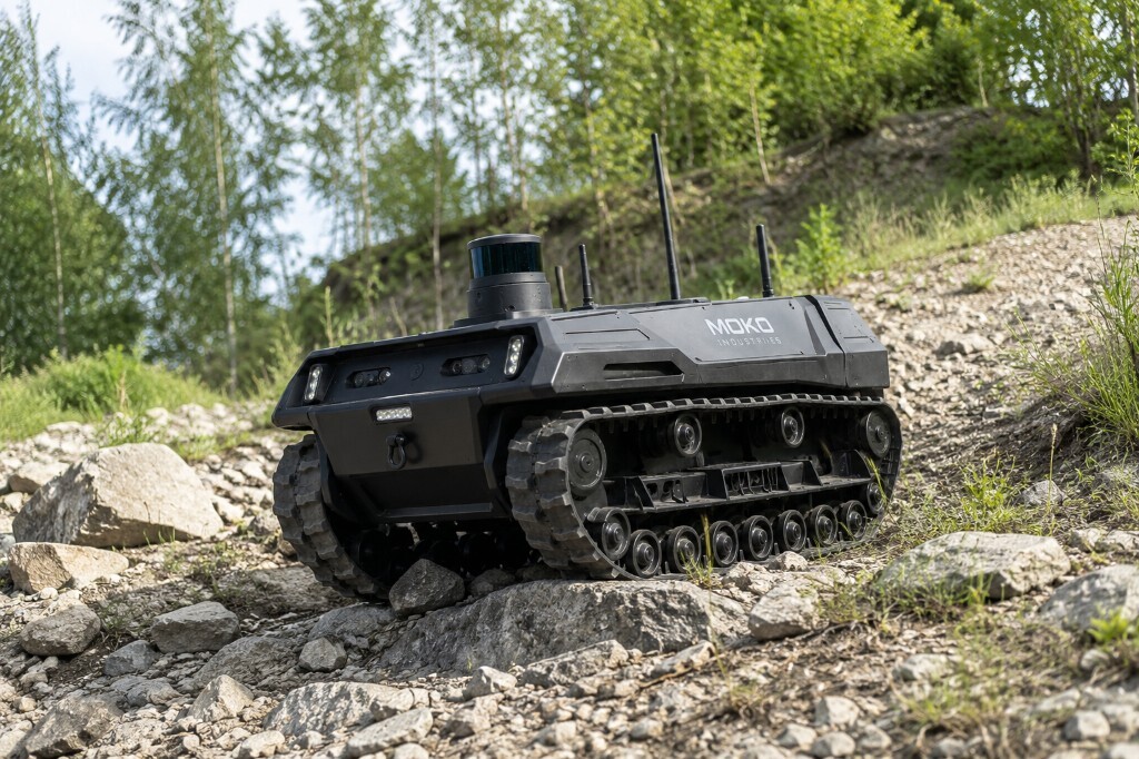 Scout tracked UGV by Moko Industries navigating rocky outdoor terrain