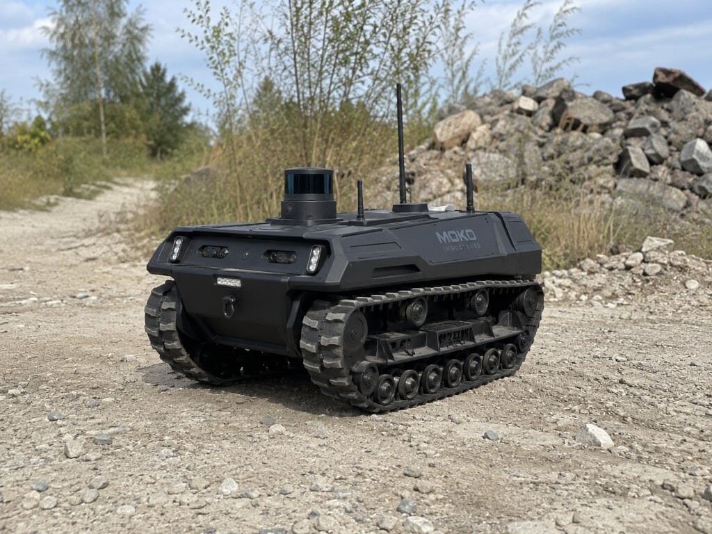 Scout autonomous robot by Moko Industries on gravel with LiDAR and antennas visible